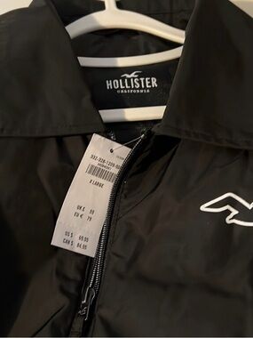 Hollister Black Zip-Up Windbreaker with White Logo Accent